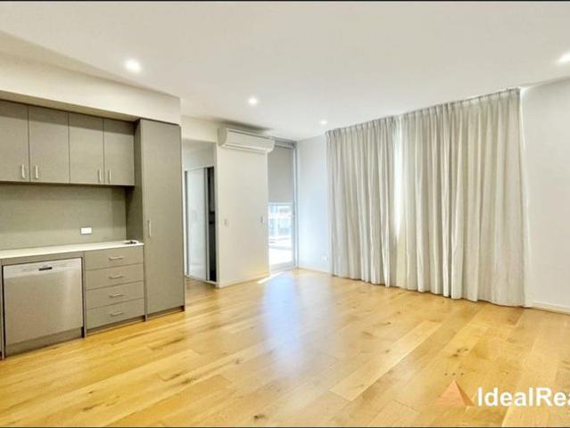 Modern Lifestyle and Unbeatable Convenience in a Top Floor Apartment