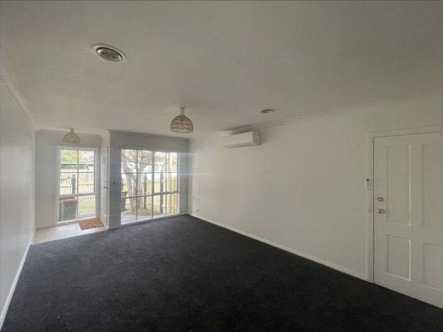 MODERN, LIGHT FILLED AND CENTERALLY LOCATED
