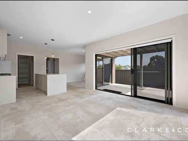 MODERN LUXURY LIVING IN A PEACEFUL BOLWARRA SETTING!