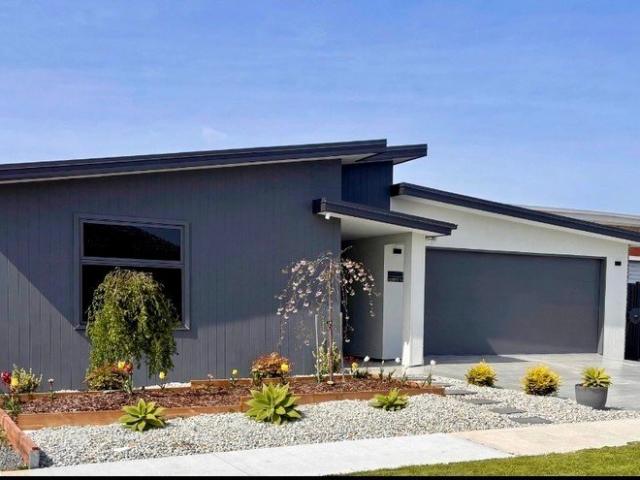 Modern Luxury Living Steps from the Riverfront & Moments from the Beach With second private residents
