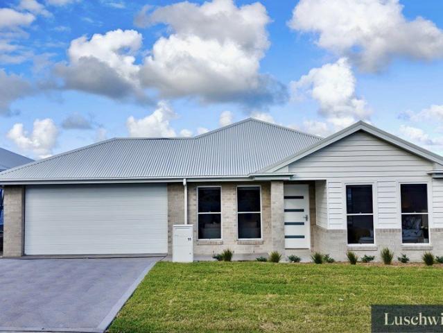 Modern Luxury with Northern Rear Aspect & Drive Through Garage