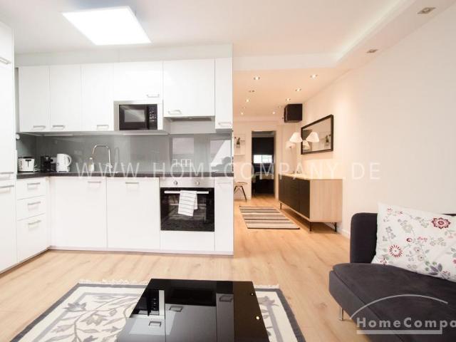 Modern möblierte 4 Zimmer Wohnung mit Balkon in sehr zentraler Lage
