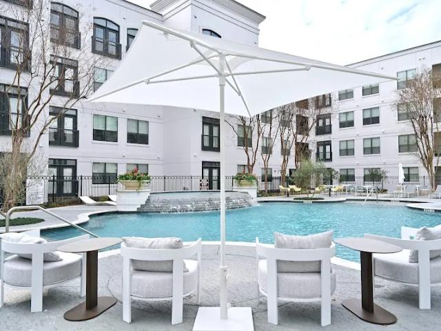 Modern Montrose & Museum District Living with Coworking and a Pool | 2BR from $2,303/mo