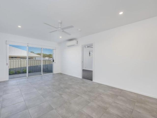 MODERN MORISSET LIVING WITH A SEPARATE MEDIA ROOM