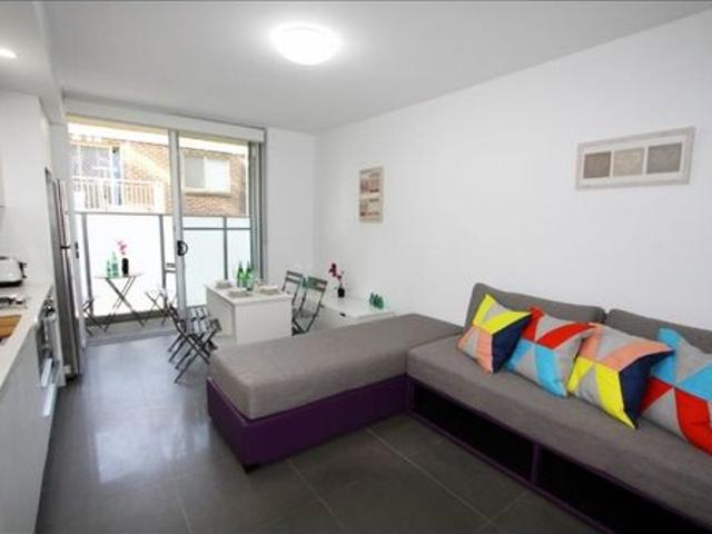 Modern mid floor studio with parking