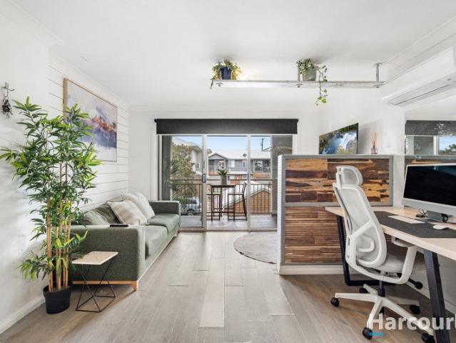 Modern north facing one bedder in convenient spot