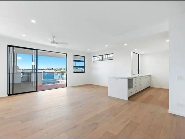 Modern North Lakes Townhome with Spacious Living, Large Balcony & Resort Style Facilities