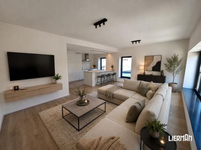 Modern nieuwbouwappartement met 2 SLKS en terras nabij cent…