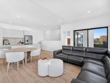 Modern Sophistication Meets Low Maintenance Living in a Prime Location