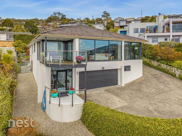 Modern Sandy Bay Home with Unforgettable Views