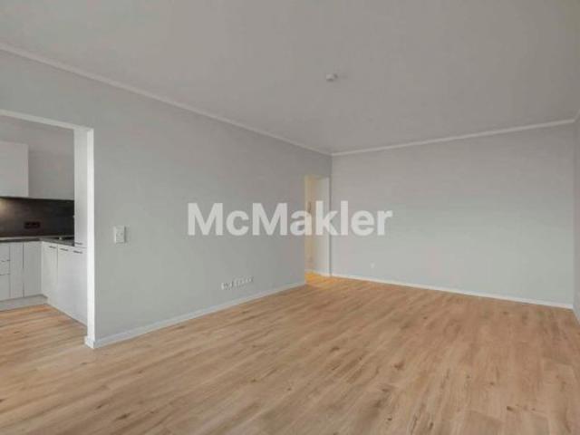 Modern sanierte 2 Zimmer Wohnung mit Loggia und Tiefgaragenstellplatz
