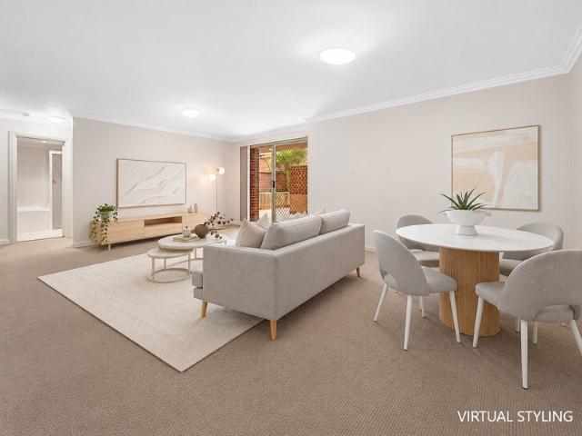 Modern, Secure Two Bedroom Oasis Nested at Rear of Block
