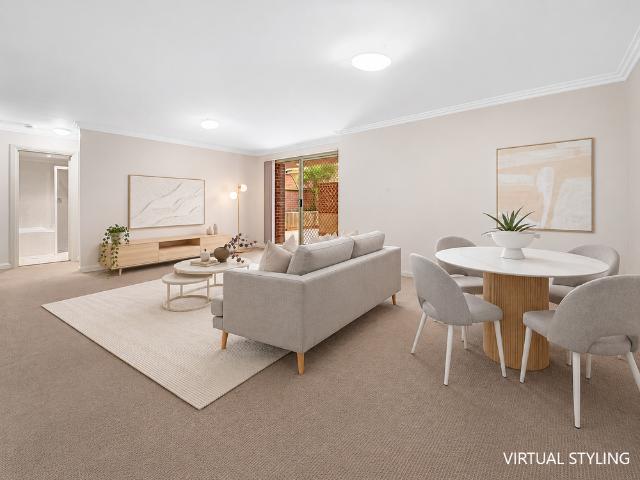 Modern, Secure Two Bedroom Oasis Nested at Rear of Block