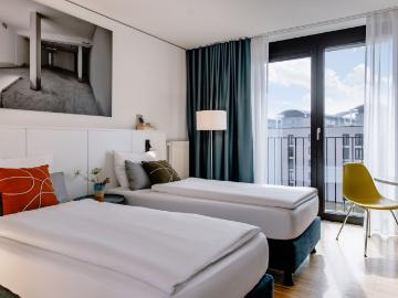 Modern Serviced Apartment for two at the Olympiapark with fitness studio, 9 min to the main train station