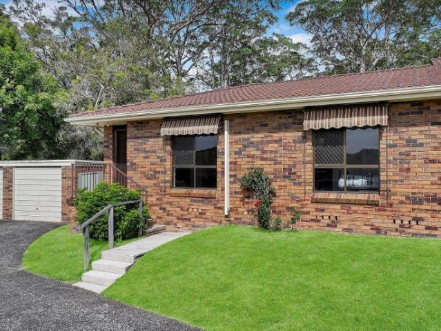 Modern Single Level Living with Private Backyard