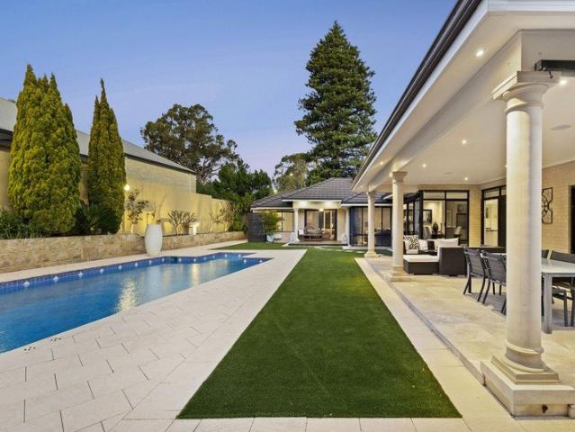 MODERN, SINGLE LEVEL LIVING IN THE HEART OF THE VILLAGE