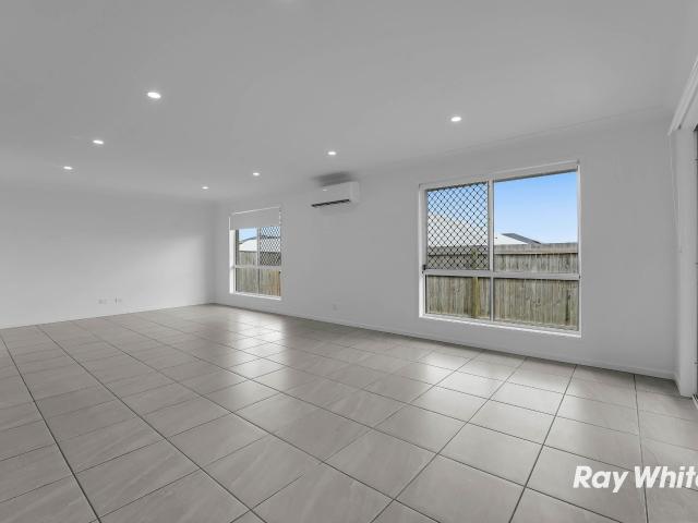 Modern, Spacious Living 4 Bedrooms, 3 Bathrooms & Multiple Living Areas!
