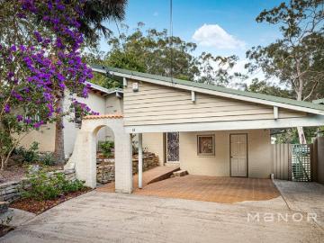 Modern Split Level Entertainer in a Quiet, Family Friendly Setting, Backing onto Reserve