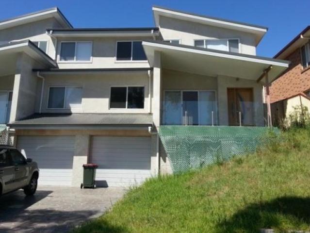 MODERN SPLIT LEVEL LIVING WITH A BEAUTIFUL OUTLOOK