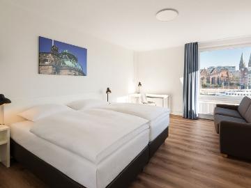 Modern studio for up to 2 persons on the banks of the Weser with panoramic view of the historic old town, directly in the centre of town, Bremen Amsterdam Apartments for Rent