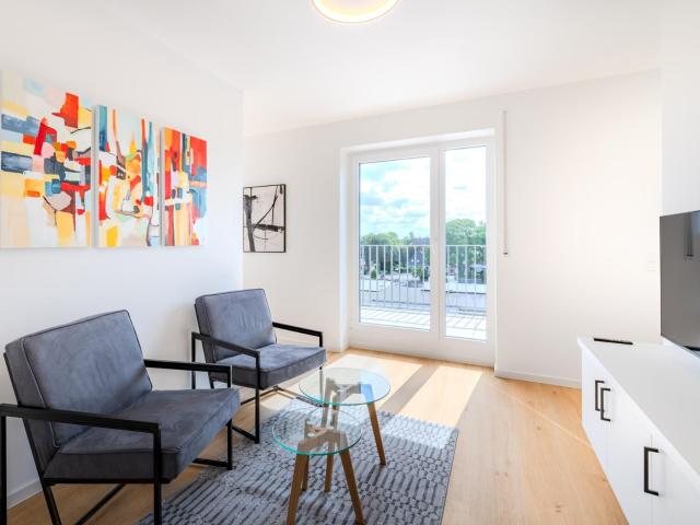 Modern studio in the attic with balcony