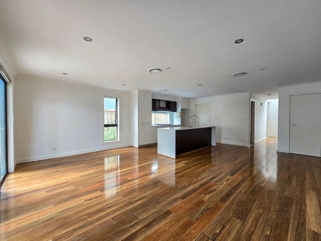 Modern Style & Effortless Living in Prime Catherine Field Location