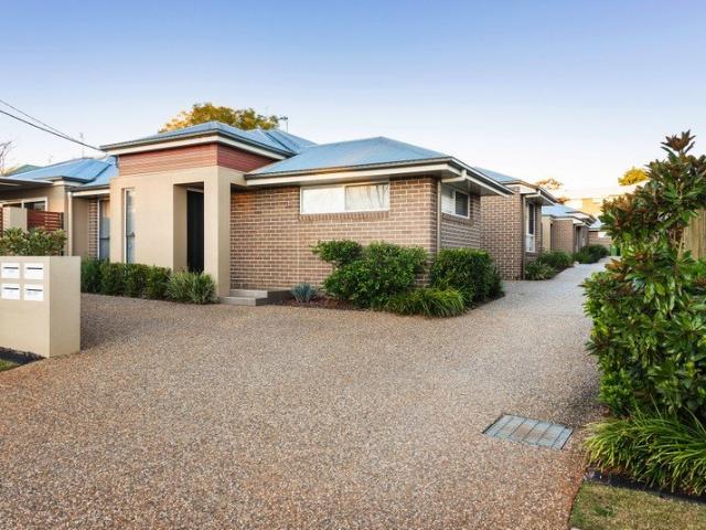 Modern, stylish unit Low maintenance & conveniently located!