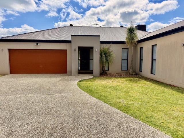 MODERN. STYLISH. SOPHISTICATED. A WHOLE LOT OF HOUSE