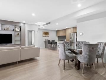 Modern, Sun Drenched Apartment Walking Distance to Schofields Village & Train Station!