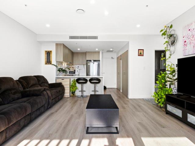 Modern, Sun Drenched Apartment with North Facing Balcony |10 Minute Walk to Westpoint Blacktown!