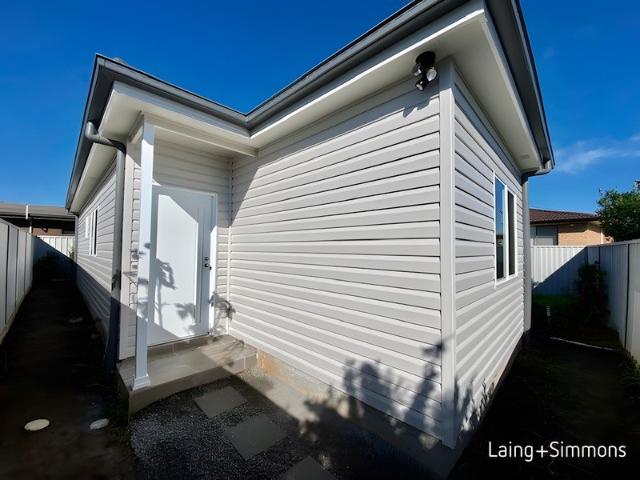 Modern & peaceful two bedroom garden home close to amenities