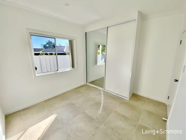 Modern & peaceful two bedroom garden home close to amenities