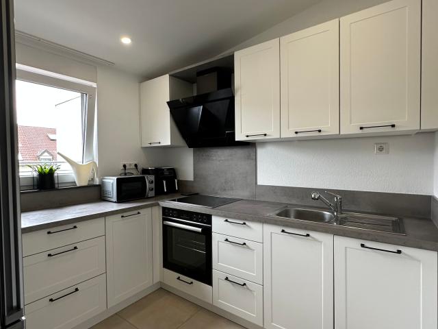 Modern, renovated, and fully furnished 2025 2.5 room apartment in luxurious penthouse style with garage – ideal for company employees