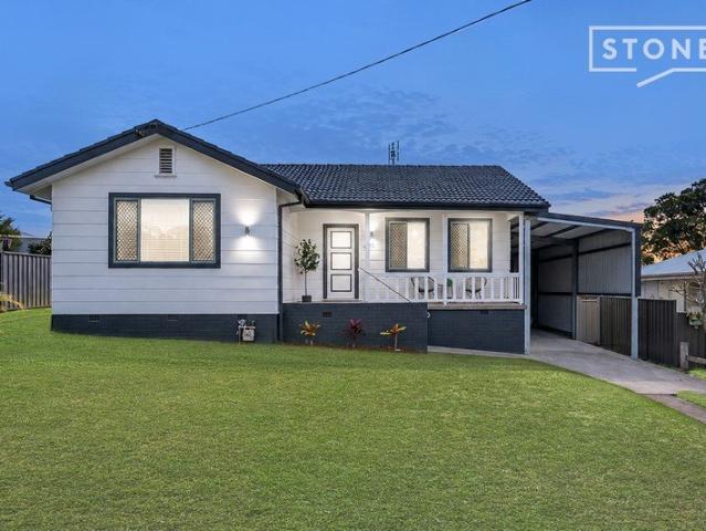 Modern renovation, massive carport and spacious yard
