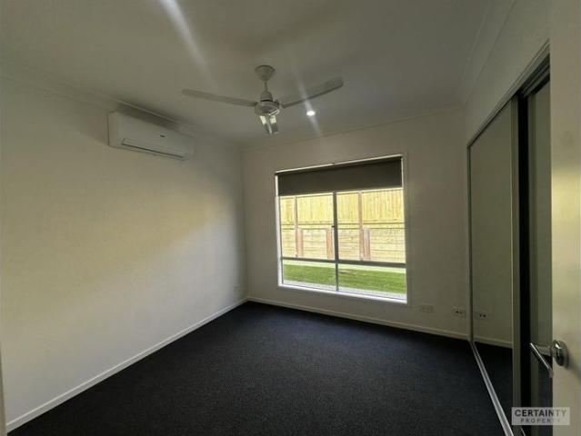Modern Rental Property in Tranquil Tinana Neighborhood Available now!