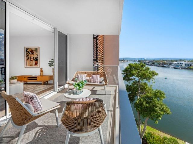 MODERN RIVERFRONT APARTMENT WITH TRANQUIL WATER VIEWS