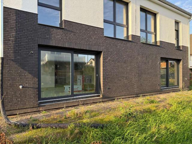 Modern wohnen Energie bewusst nutzen Neubau Doppelhaushälfte