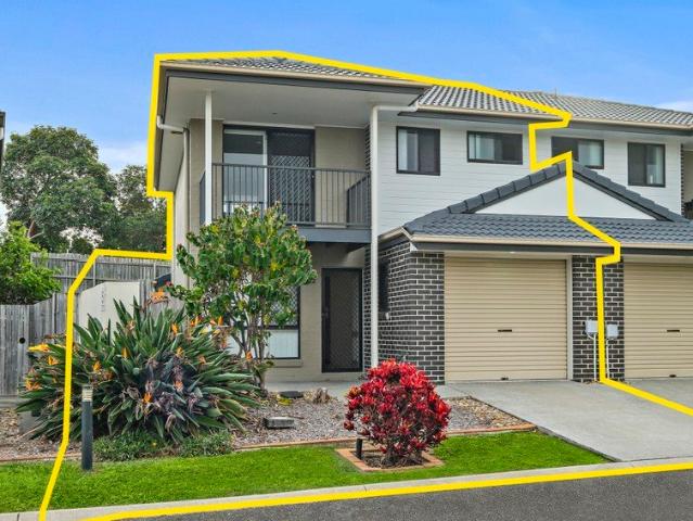 Vacant & ready to Move In Modern Townhouse Offering Space, Style & Comfort with Large Backyard & Side yard