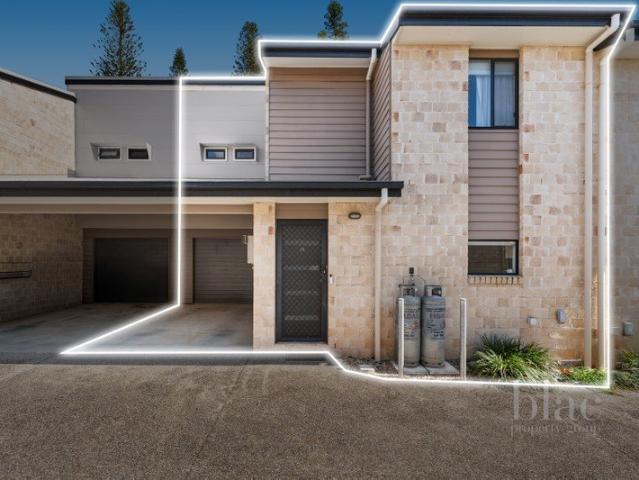 Modern Townhouse Living with Private Courtyard & Second Car Space