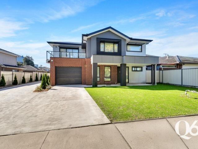 MODERN TOWNHOUSE LIVING IN A HIGHLY CONVENIENT LOCATION!