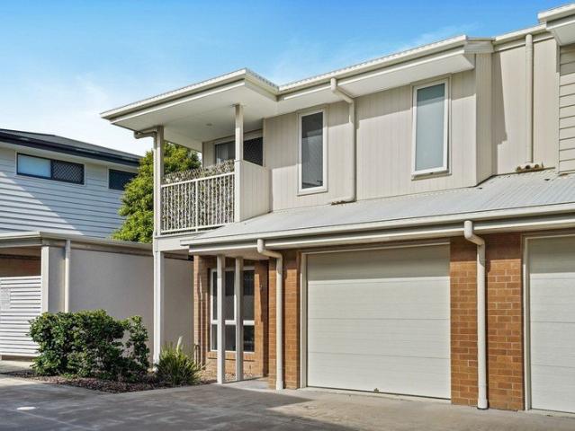 Modern Townhouse Living in a Peaceful Parkside Setting