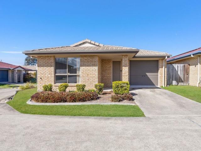 Modern Townhouse Living in a Peaceful, Well Maintained Complex