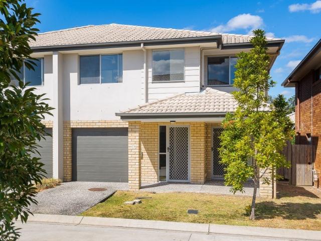 Modern Townhouse Living In A Secure Gated Community!