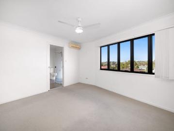 Modern Townhouse with Private Courtyard in Prime Coorparoo Location