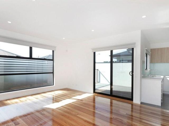 Modern townhouse with quality fittings and fixtures, flooded in natural light