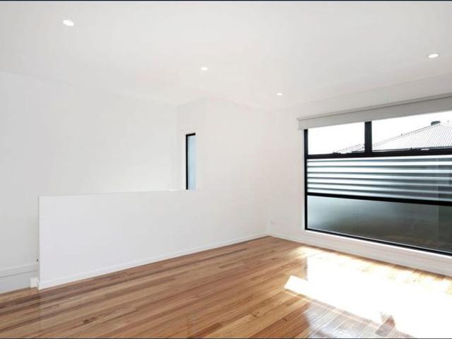 Modern townhouse with quality fittings and fixtures, flooded in natural light