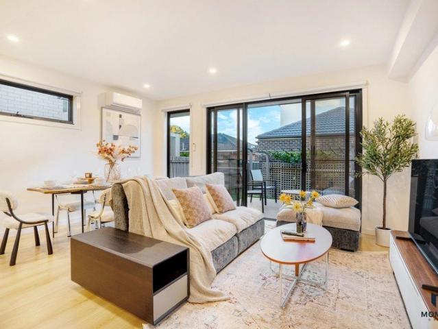 Modern Townhouse with Two Master Suites & East Facing Deck