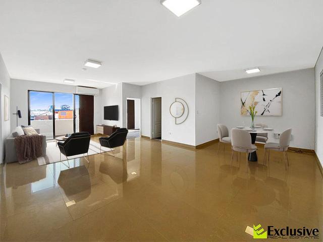 Modern Top Floor Apartment with District Views