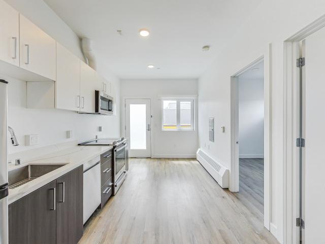 Modern Top Floor 2BR with Huge Private Patio | Uptown Oakland | Walk Score 96