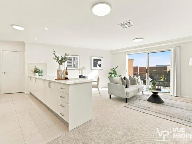 Modern Top Level Apartment with Uninterrupted District Views